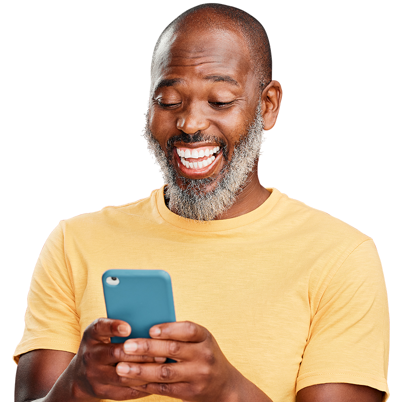 man smiling at phone