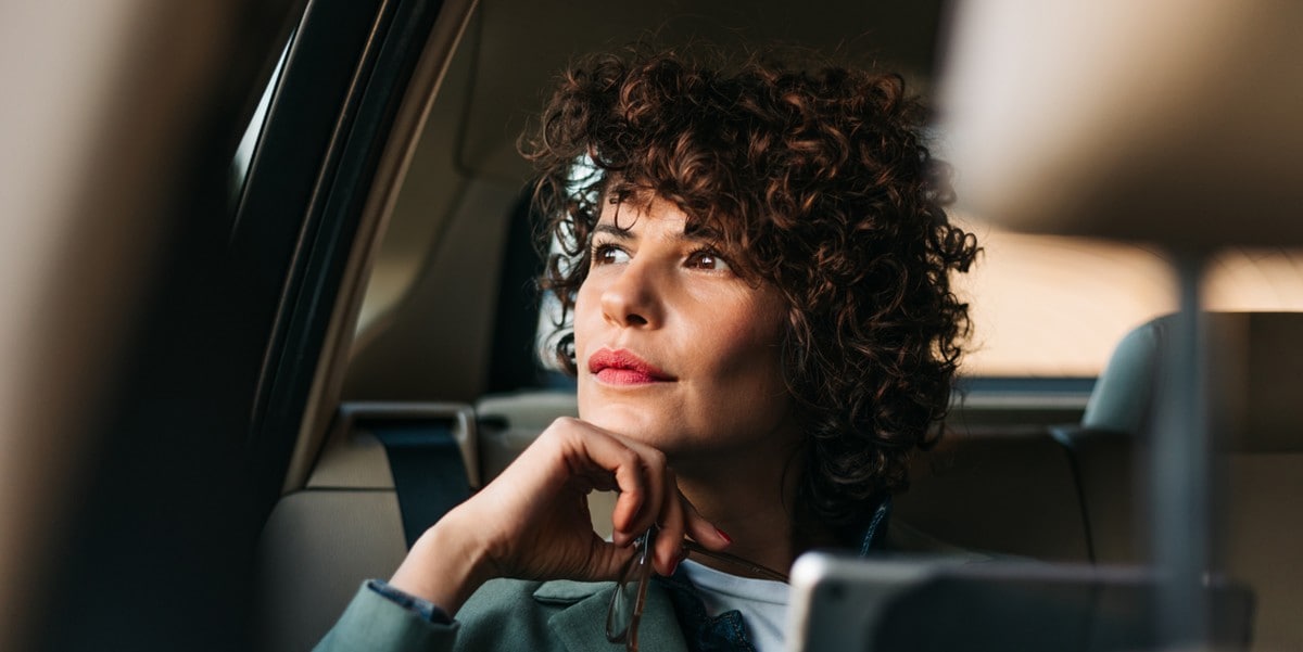woman traveling by car