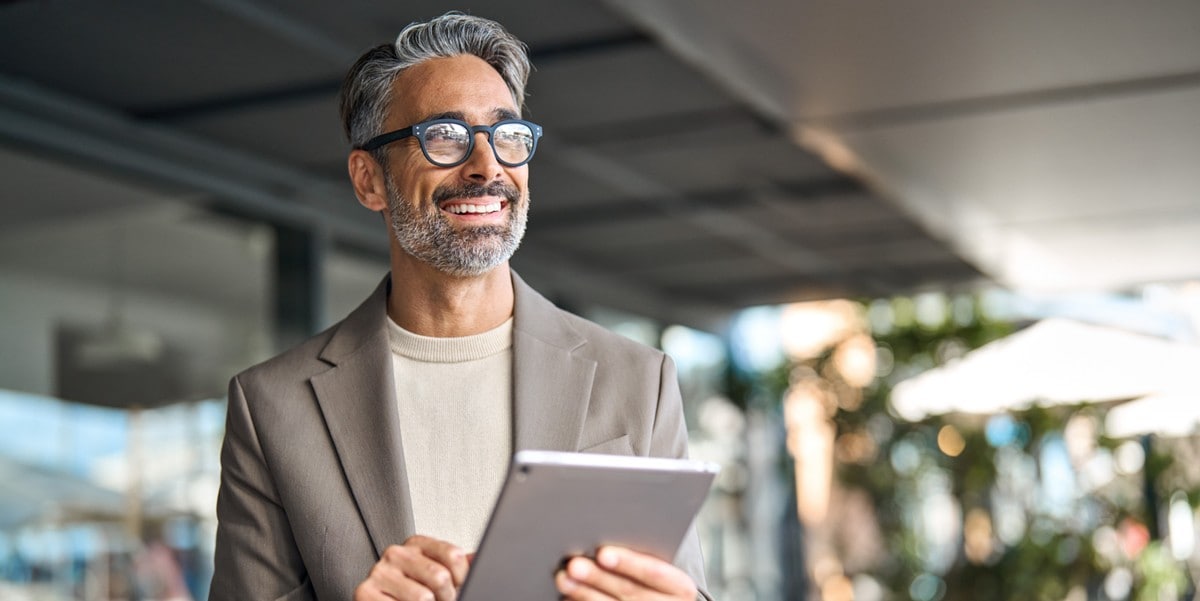 professional man holding a tablet