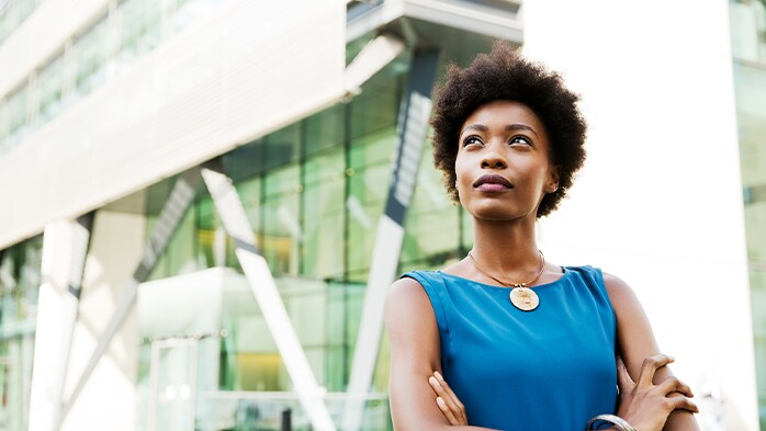 woman standing in front of a building