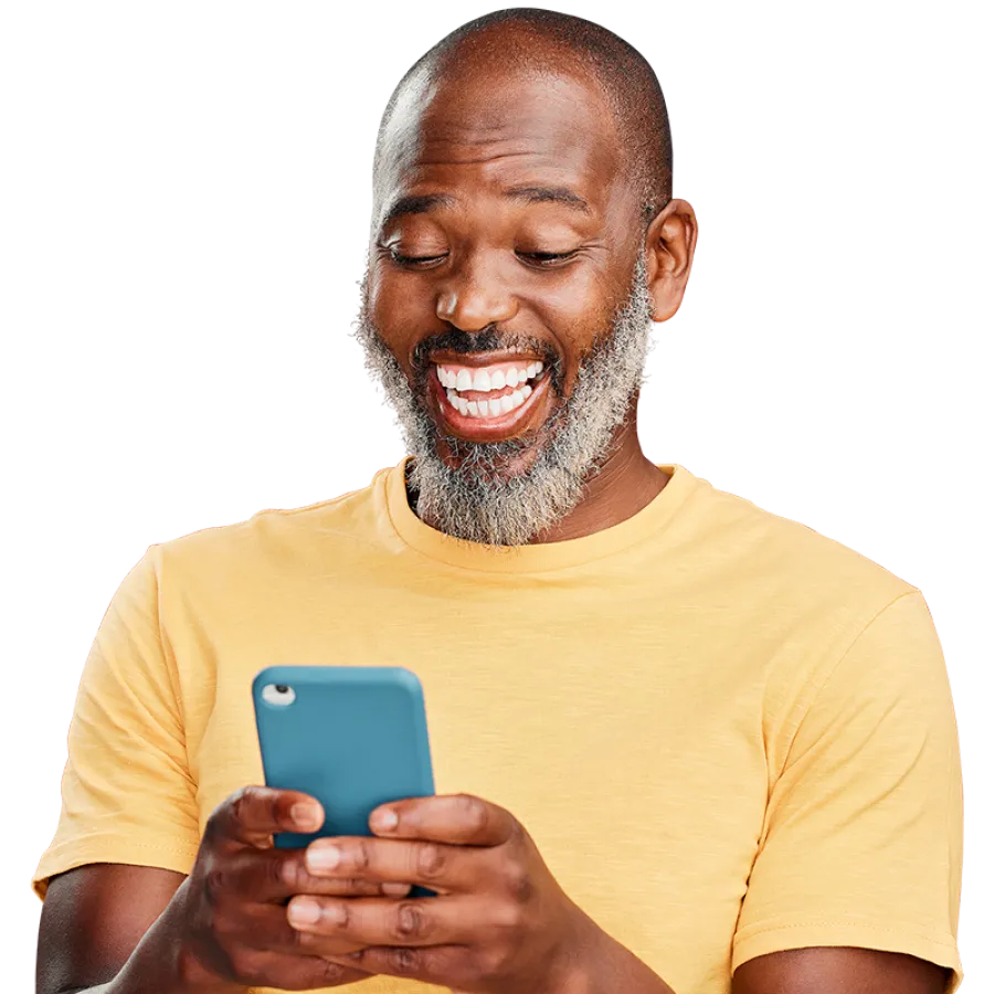 man smiling at phone