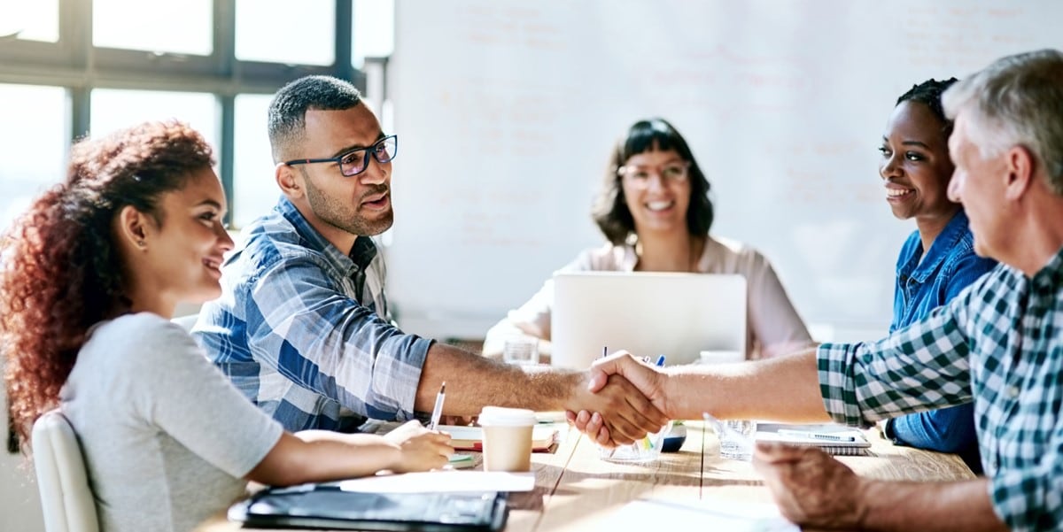 group of people in a meeting in office