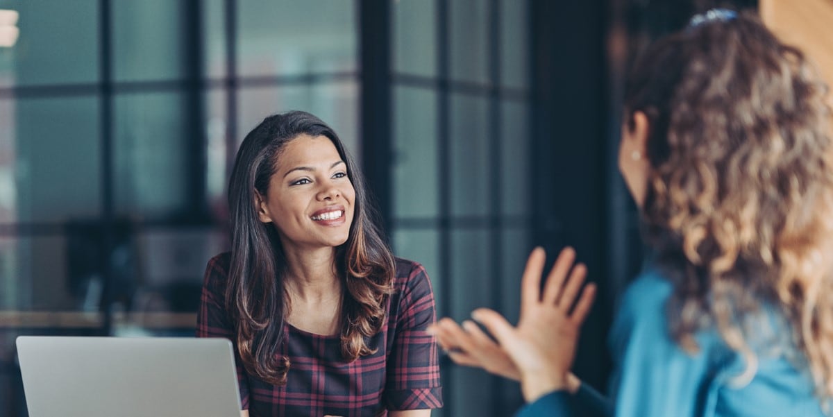 two women meeting in office