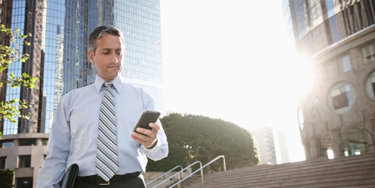 man outside on his phone