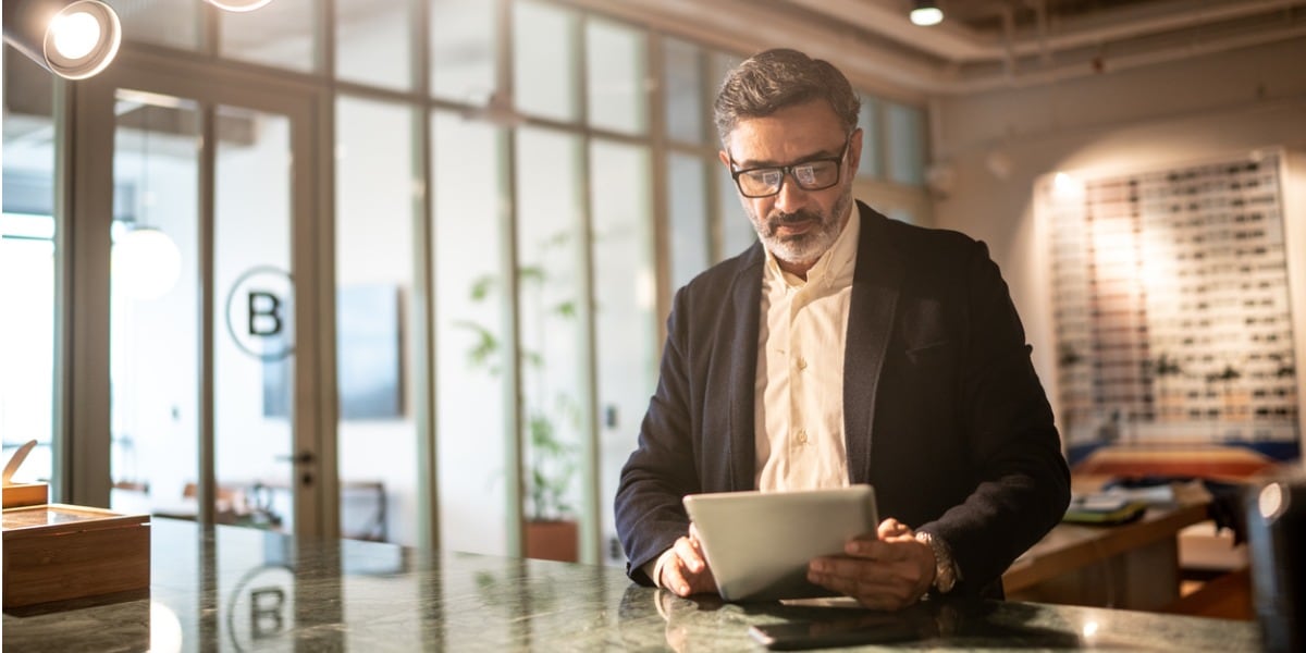 mature businessman working on laptop